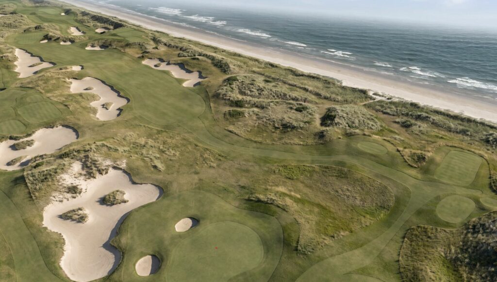 Aerial view of the redesigned closing holes at Seapoint Golf Links beside the Irish Sea